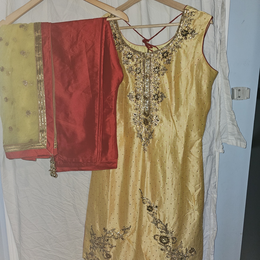 Gold Embroidered Punjabi Suit with Red and Yellow Dupatta. Pant Bottoms